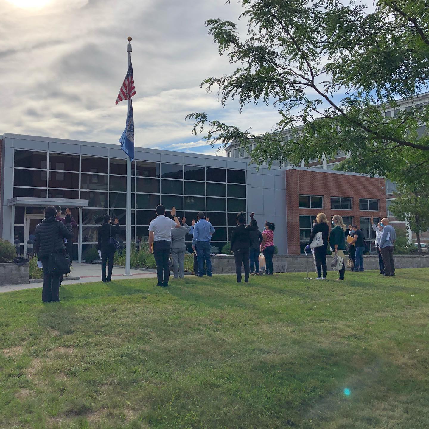 Naturalization ceremony on the front lawn of the Lawrence Field Office